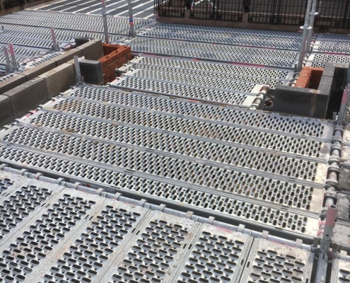 Access scaffolding with edge protection and scaffold decks for industrial site